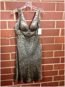Option 2- You will shine but not out do the bride in this one. Size Small and currently $32 on consignment.