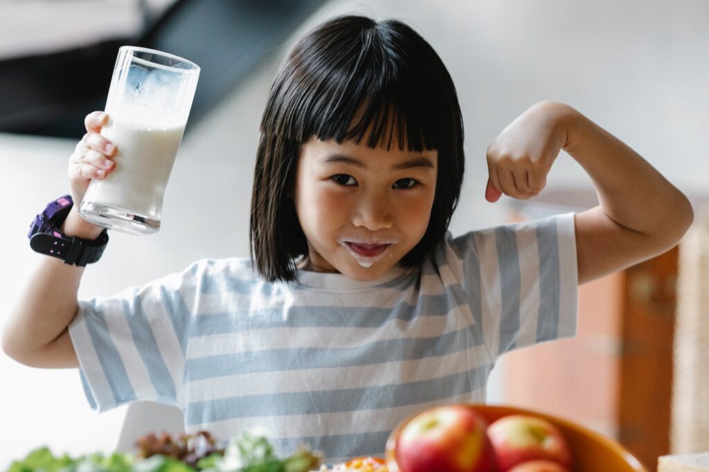 asian girl with milk on lips